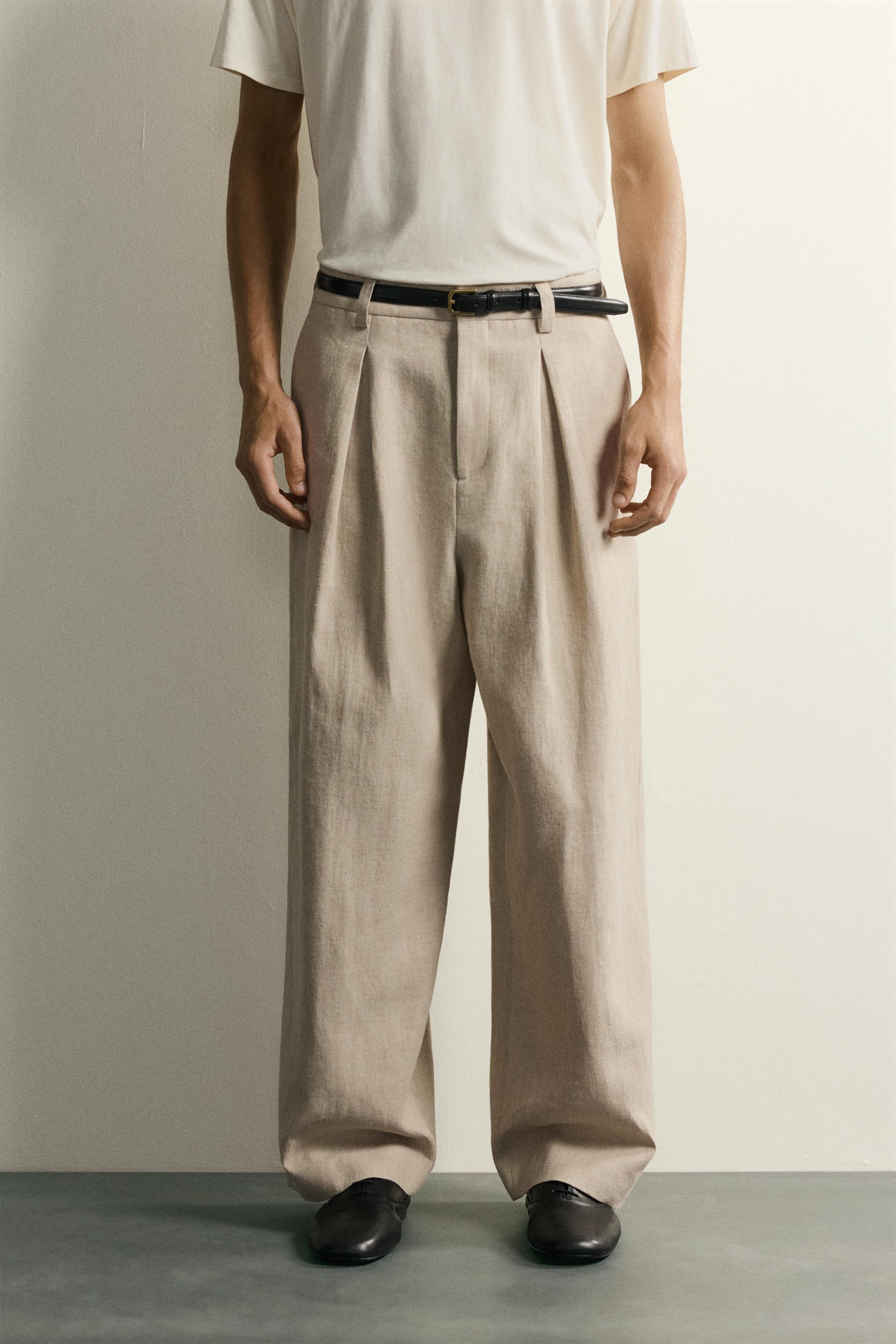 RELAXED FIT PLEATED SUIT PANTS